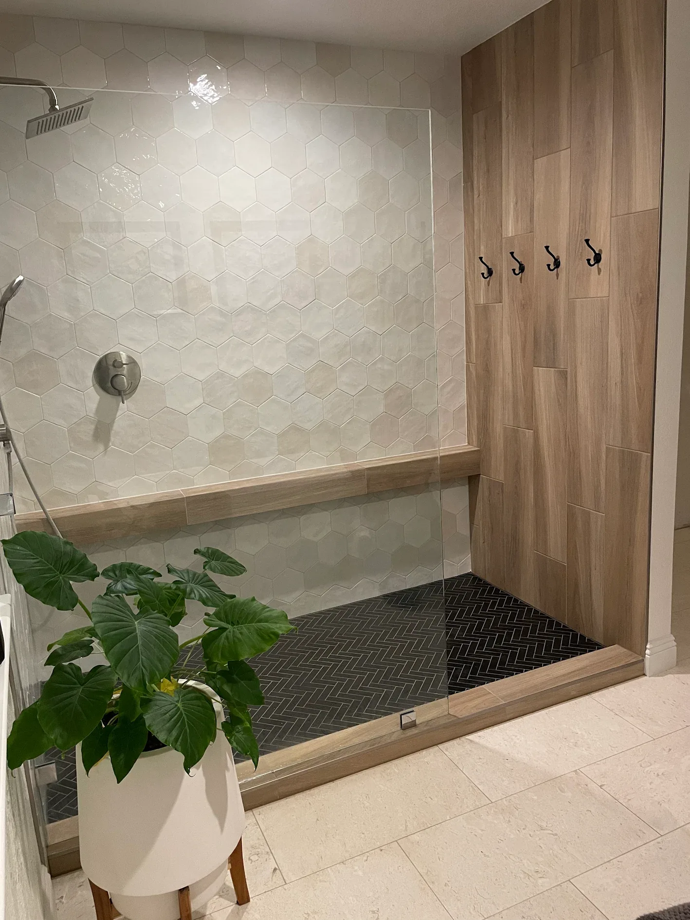 Custom hex tile shower with frameless glass
